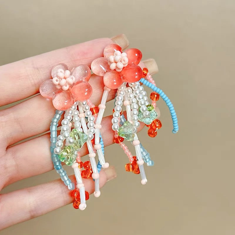 6009 Peach blossom tassel earrings